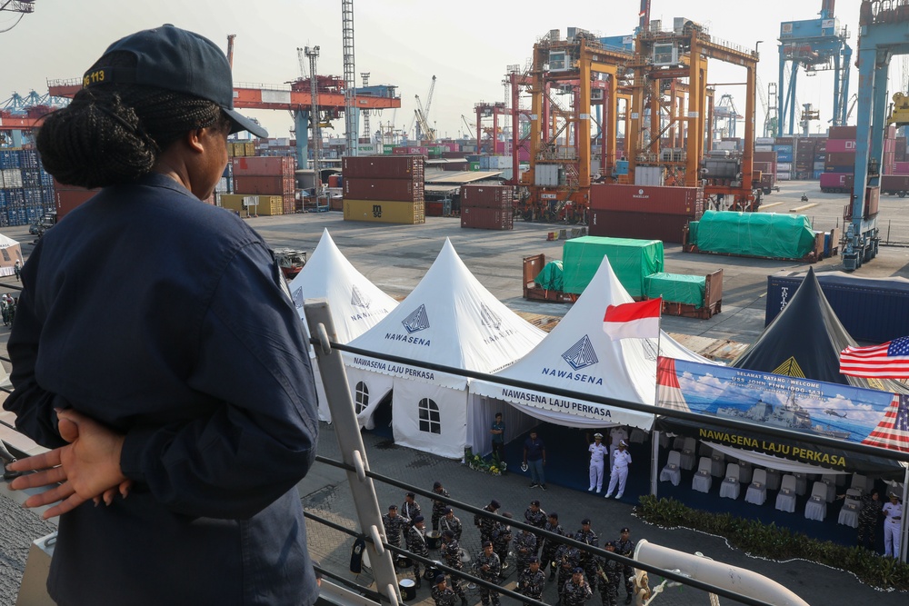 Sailors aboard the USS John Finn conduct a sea and anchor detail in Jakarta, Indonesia