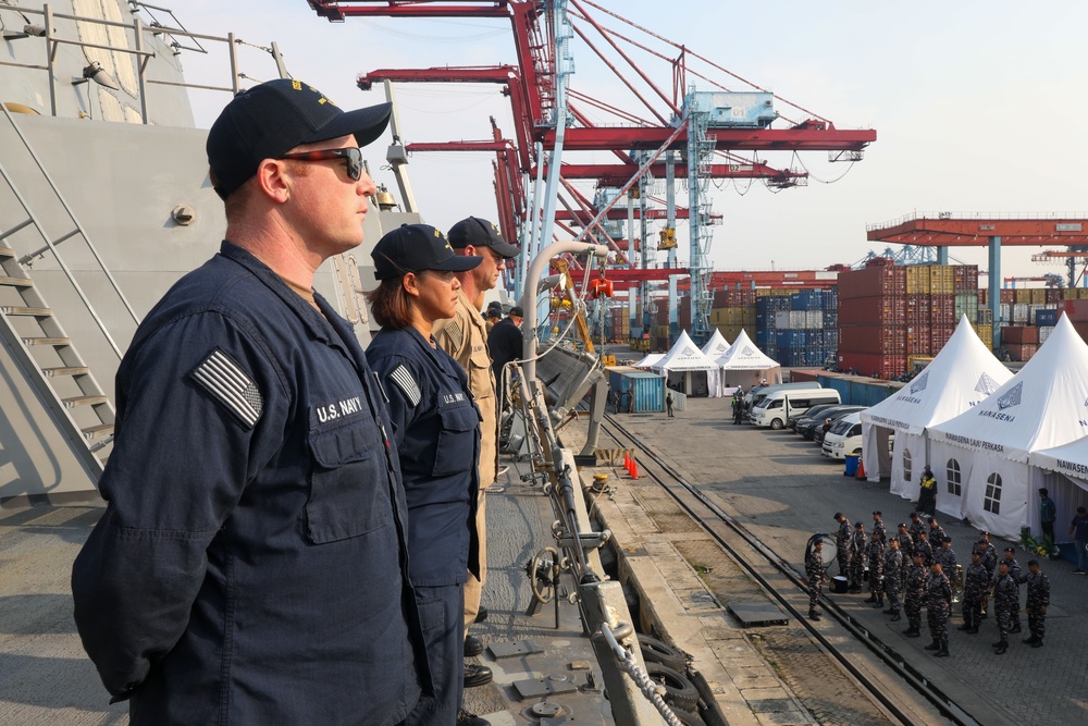 Sailors aboard the USS John Finn conduct a sea and anchor detail in Jakarta, Indonesia