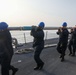 Sailors aboard the USS John Finn conduct a sea and anchor detail in Jakarta, Indonesia