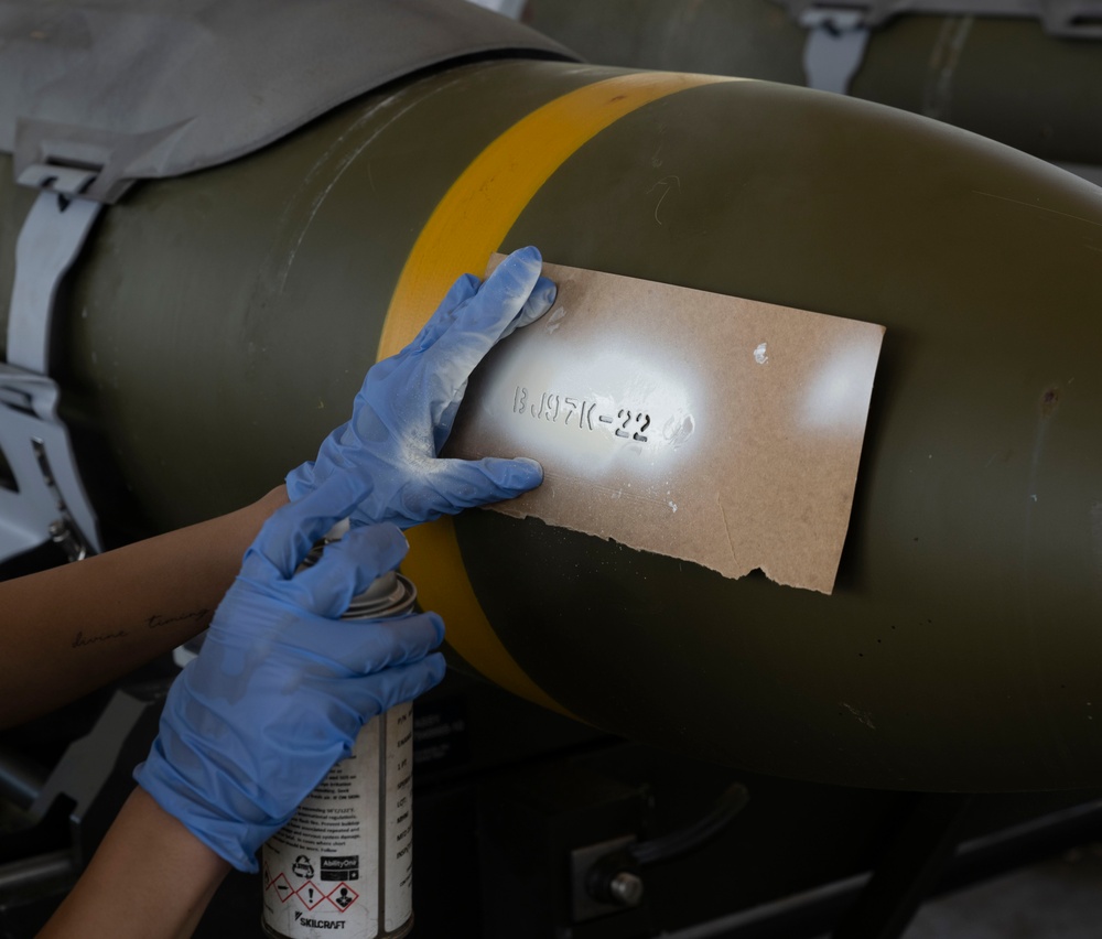 Munitions Airmen build bombs during combat deployment