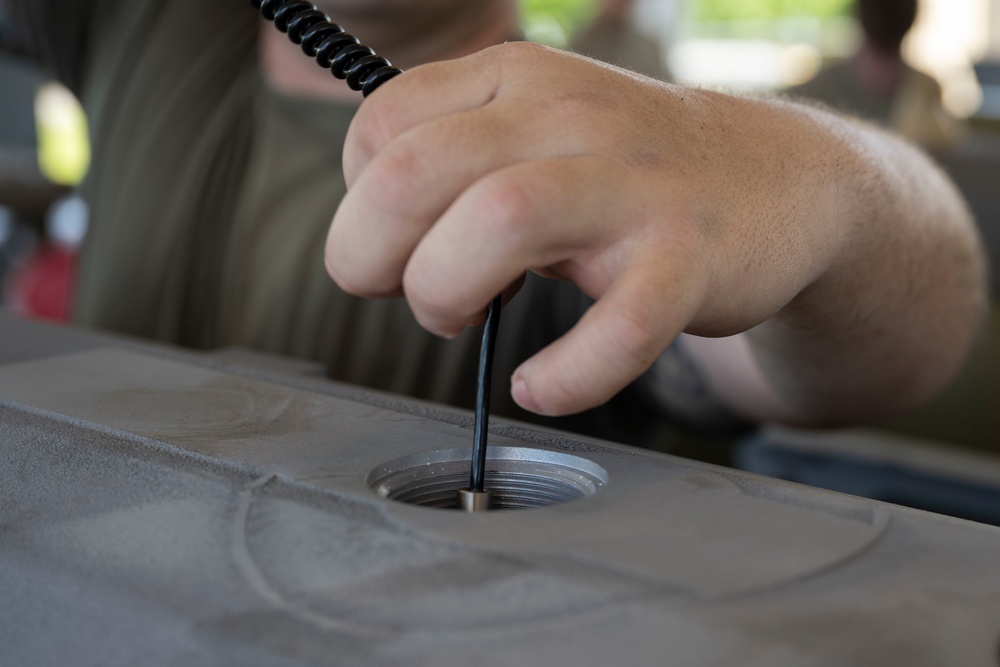 Munitions Airmen build bombs during combat deployment