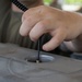 Munitions Airmen build bombs during combat deployment
