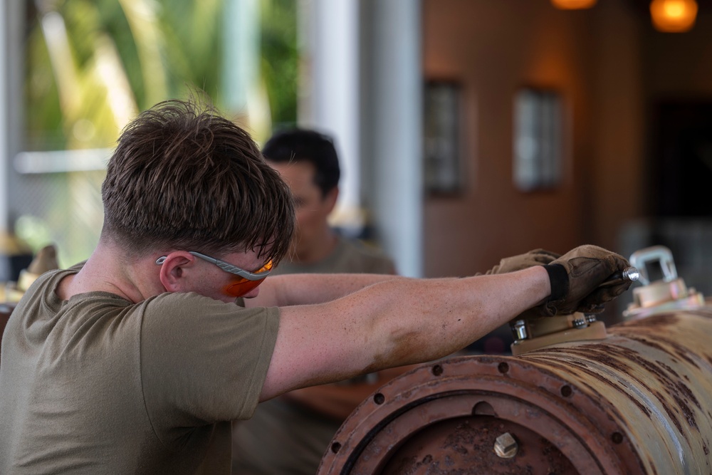 Munitions Airmen build bombs during combat deployment