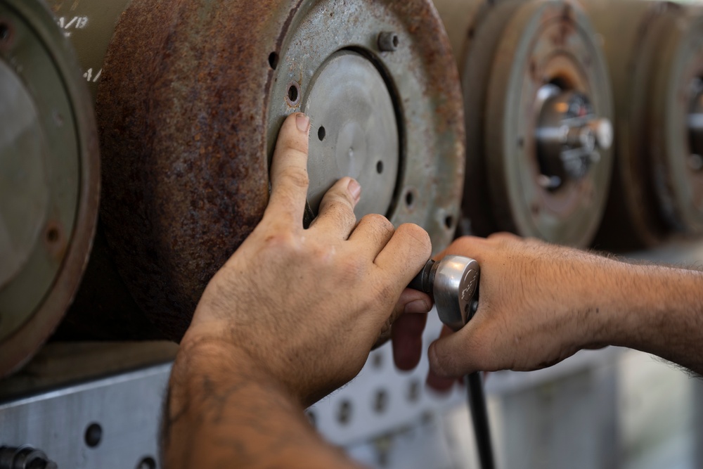 Munitions Airmen build bombs during combat deployment