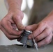 Munitions Airmen build bombs during combat deployment