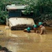 U.S. Army Soldiers rig a vehicle stuck in the mire pit during the Wheeled Vehicle Recovery Operations Course held at the 139th Regional Training Institute in Fort Bragg, NC, August 8, 2025.