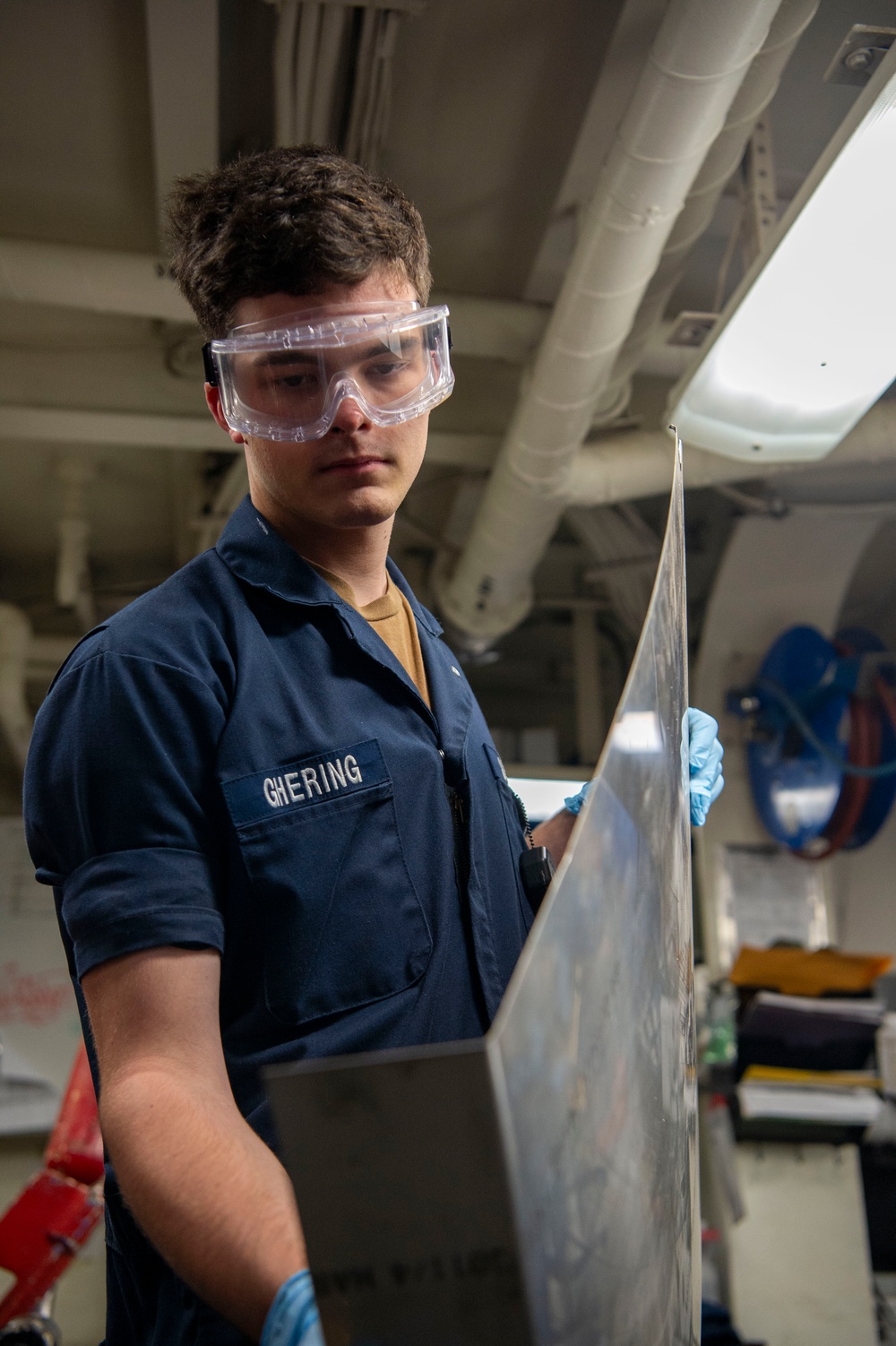 Boxer Sailors maintain equipment