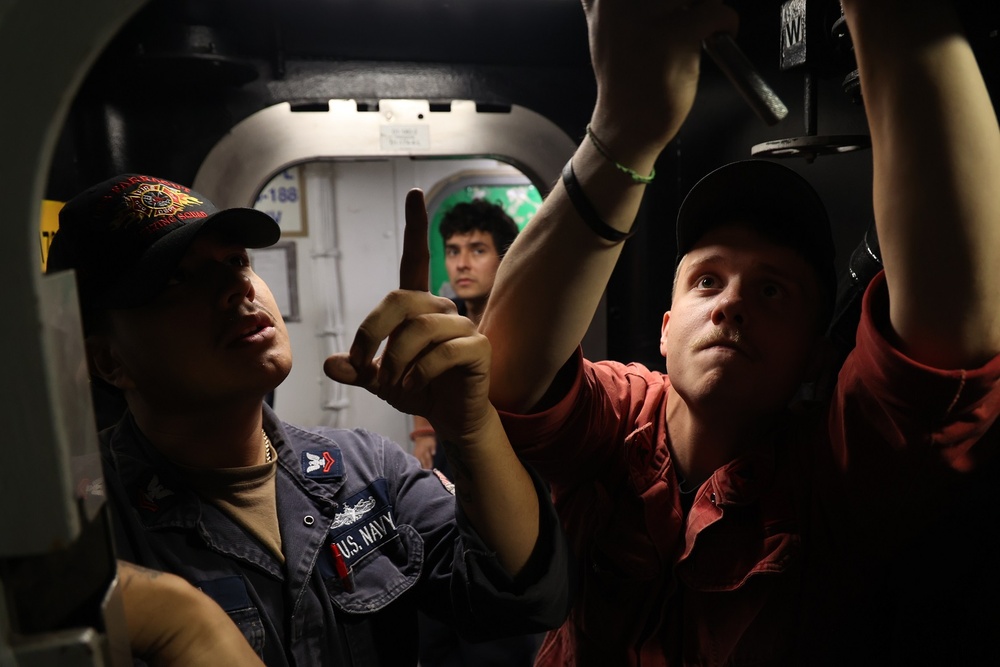 DC2 Javier Molina (left) and DC3 Dylan Hewczuk (right) Conduct Maintenance on an Airlock