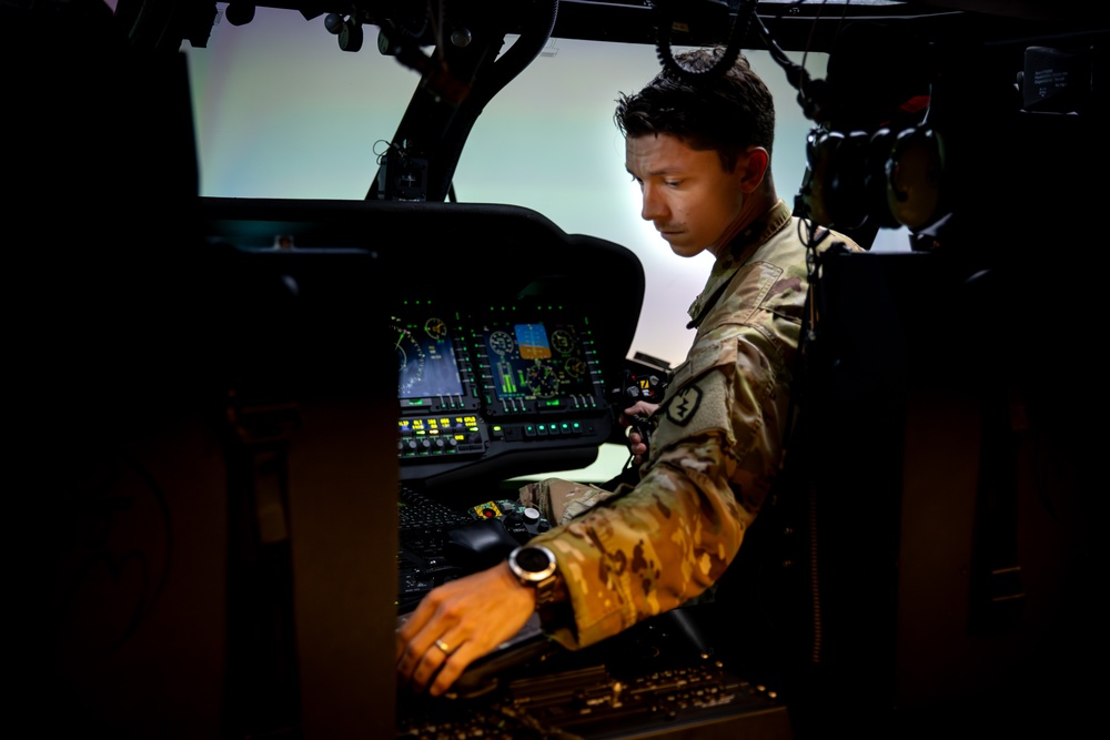 25th CAB UH-60 Blackhawk Pilots Train in Flight Simulator