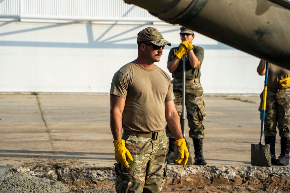 It’s all in the pour: 131st Bomb Wing civil engineering Airmen repair airfield concrete during Exercise Northern Strike 25-2