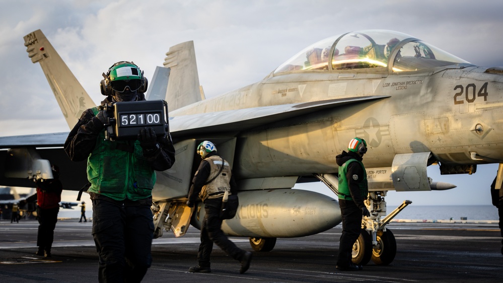 USS Gerald R. Ford (CVN 78) Sailor Operates Weight Board