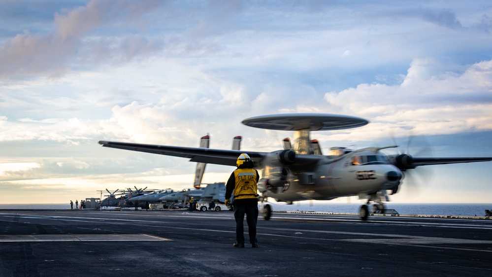 USS Gerald R. Ford (CVN 78) Sailor Observes E2-D Hawkeye Land
