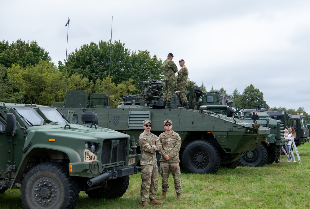 U.S. Army Soldiers stand by JLTV during static display in Poland