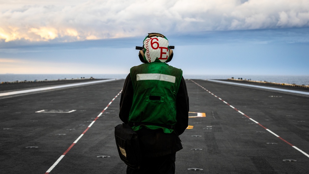 USS Gerald R. Ford (CVN 78) Sailor Observes Sunset