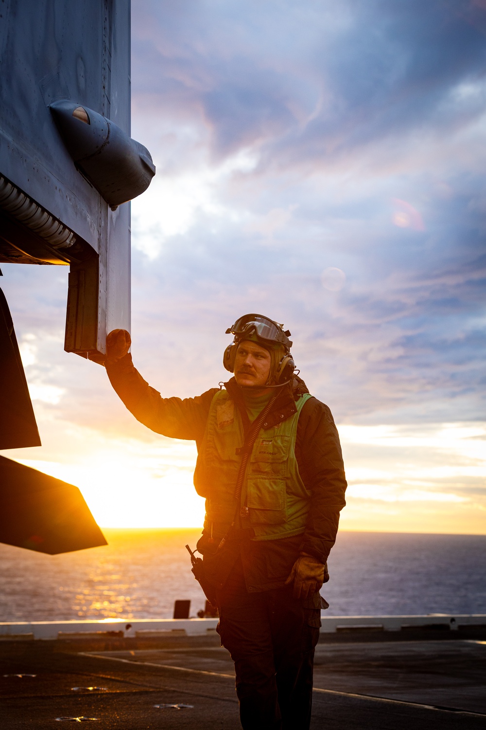 USS Gerald R. Ford (CVN 78) Sailor Observes Sunset