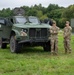 U.S. Army Soldiers stand at static equipment display