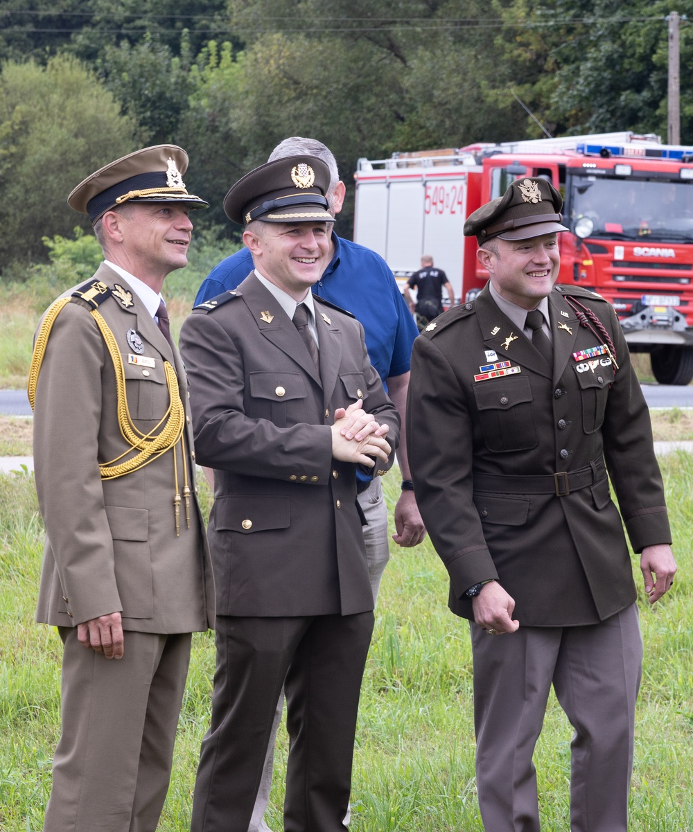 U.S. Army Maj. Converse with NATO allies during festival