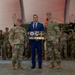 U.S. Army Soldiers give a gift to Estonian Charge d'affairs