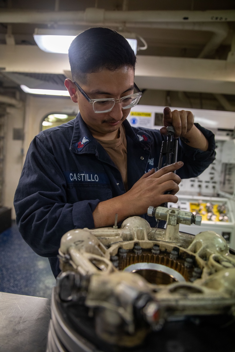 USS Gerald R. Ford (CVN 78) Sailor Conducts Maintenance