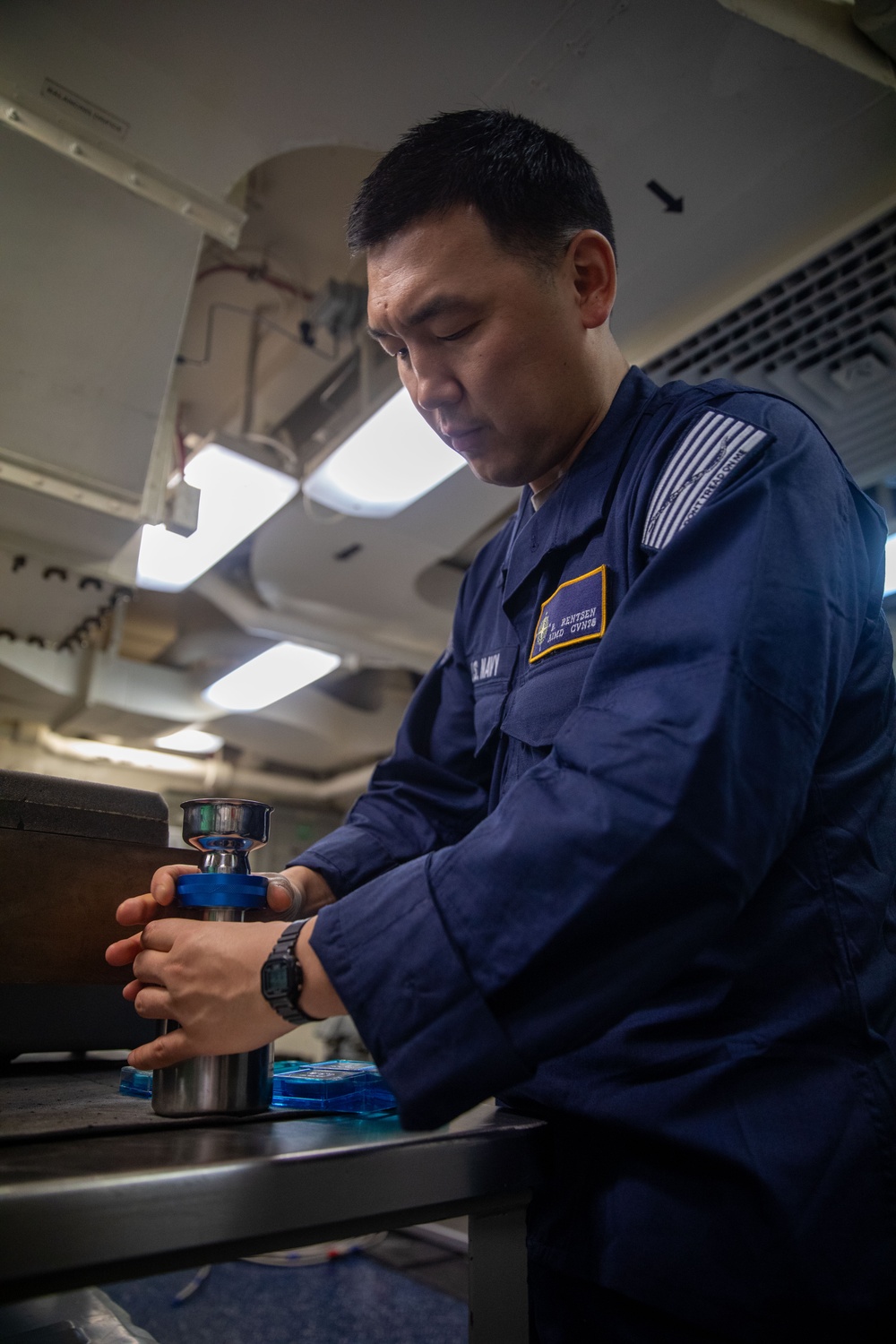 USS Gerald R. Ford (CVN 78) Sailor Conducts Maintenance