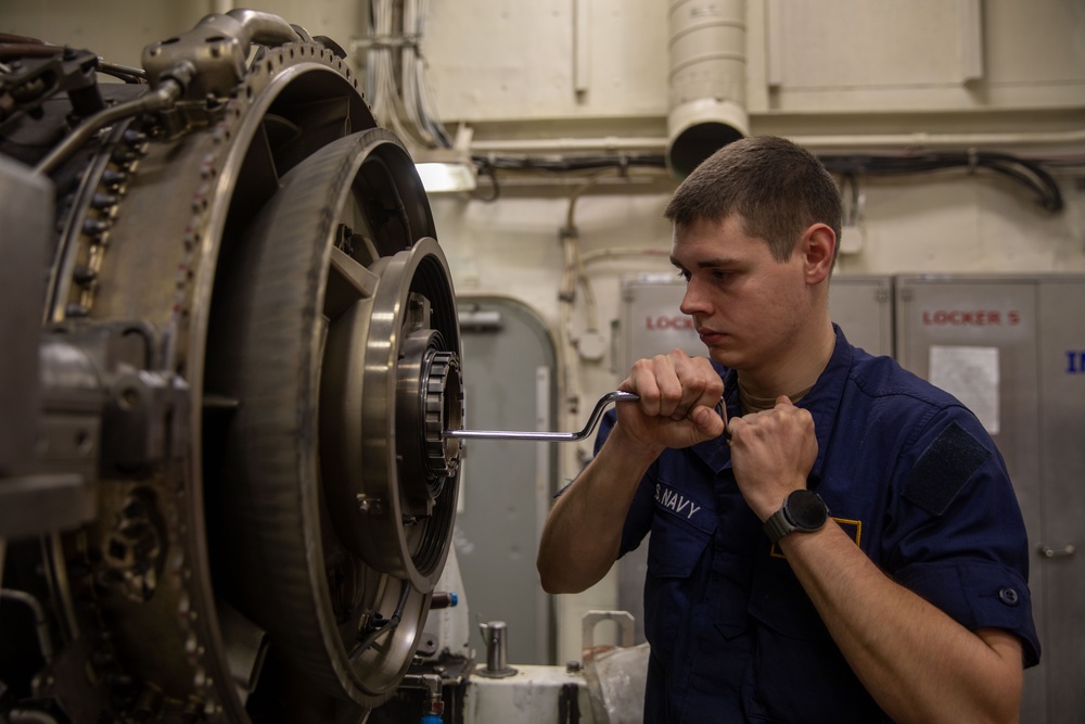 USS Gerald R. Ford (CVN 78) Sailor Conducts Maintenance