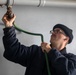 USS Gerald R. Ford (CVN 78) Sailor Conducts Preservation