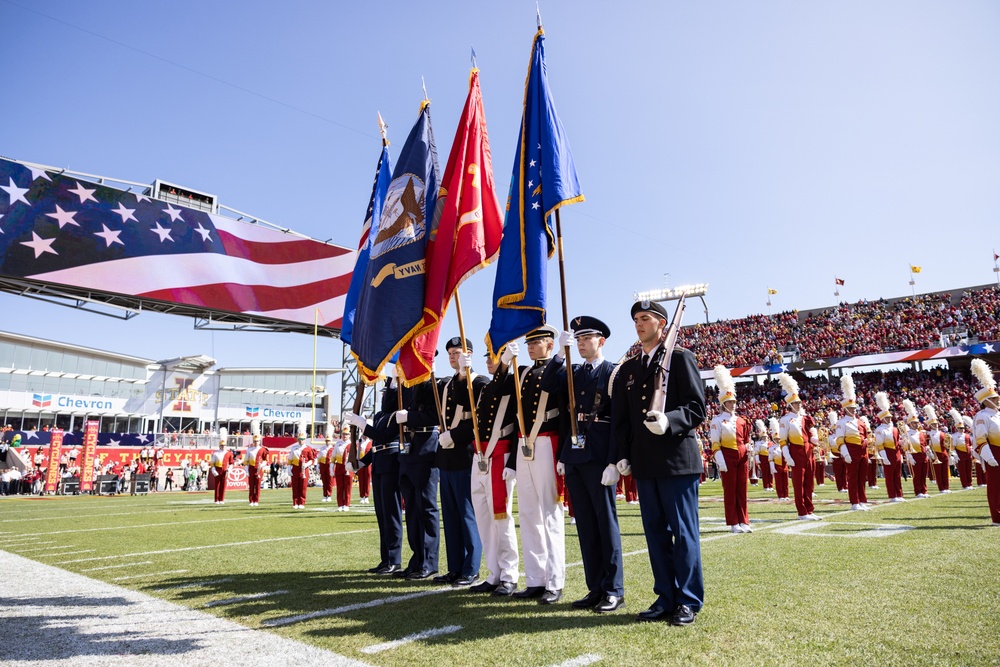 Joint service color guard presents colors at Cy-Hawk game