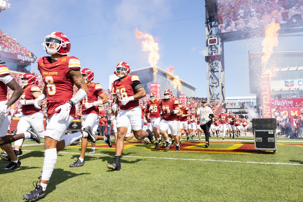Iowa State football players run onto field at Cy-Hawk game