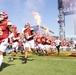 Iowa State football players run onto field at Cy-Hawk game