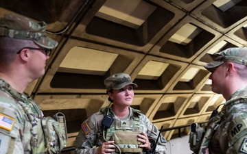 U.S. Soldiers with the 112th Military Police Battalion, MS National Guard, Patrol the Gallery Metro