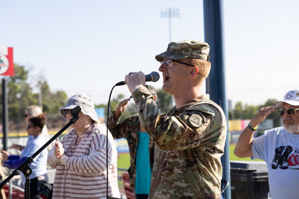 Iowa National Guard Soldier performs National Anthem at Veterans Memorial Stadium