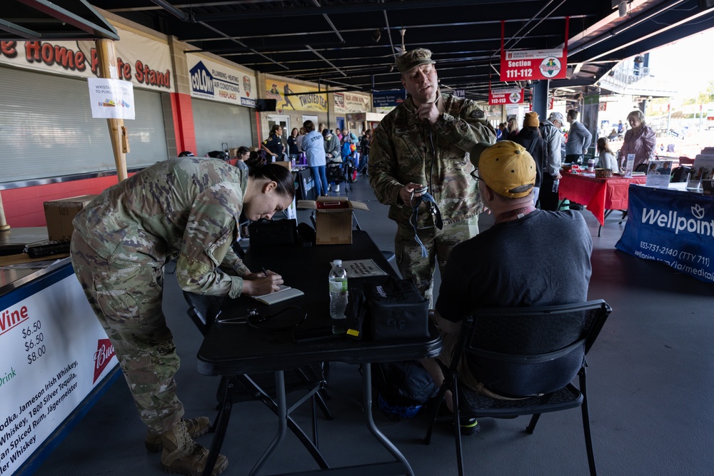 Iowa National Guard medics check blood pressure at Five Seasons Stand Down
