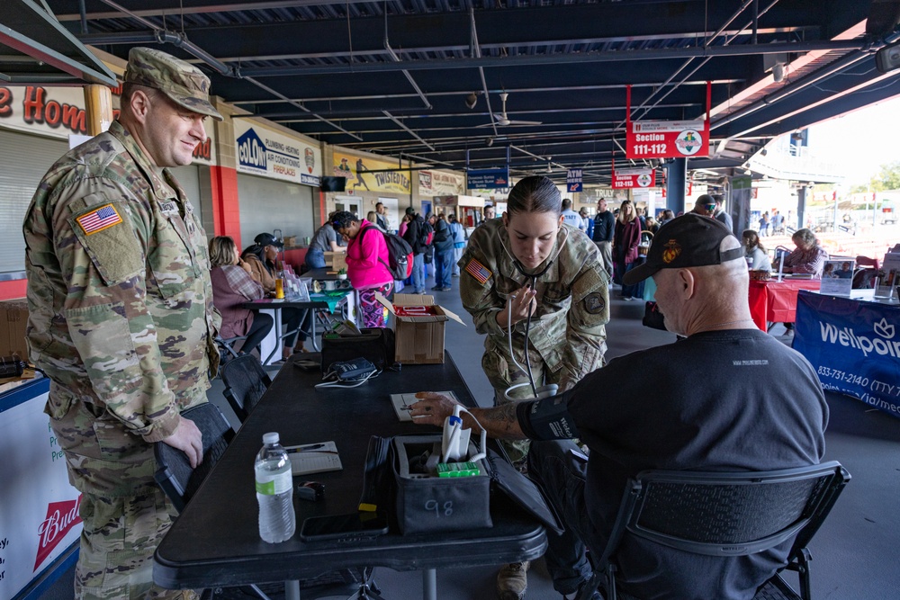 Iowa National Guard medics check blood pressures at Five Seasons Stand Down