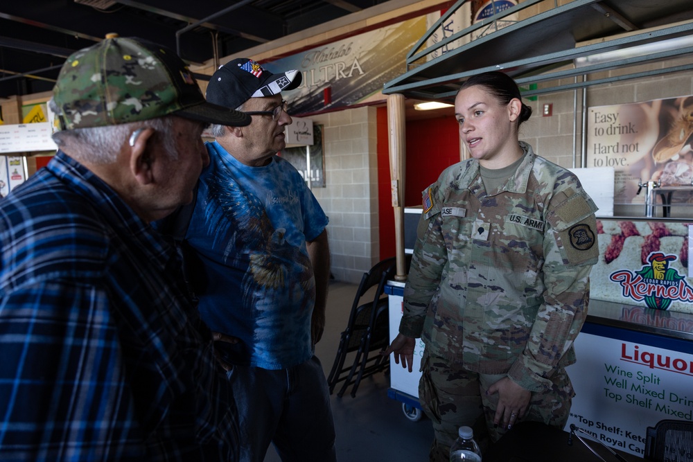 Iowa National Guard medic speaks with veterans at Five Seasons Stand Down