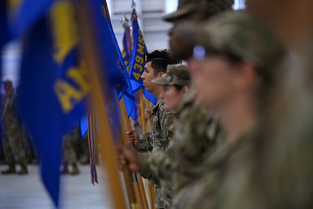 Holland takes command of the 439th AW