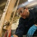 USS Gerald R. Ford (CVN 78) Sailor Conducts Maintenance