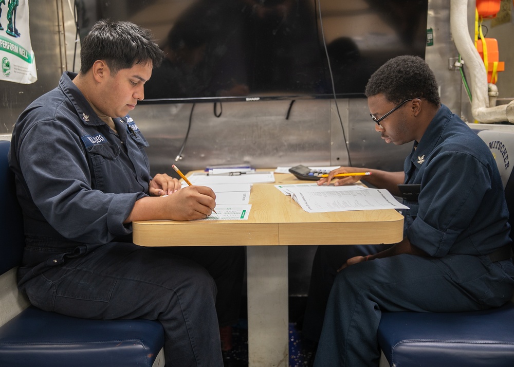 USS Mitscher (DDG 57) Sailors take the Navy-Wide E-6 Advancement Exam