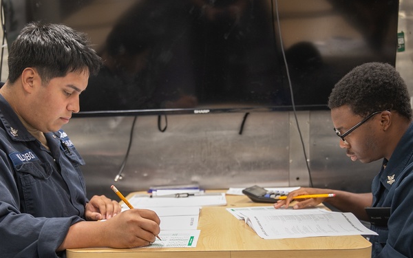 USS Mitscher (DDG 57) Sailors take the Navy-Wide E-6 Advancement Exam