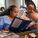 Participants Survey the Dinner Menu at a Strong Bonds Event
