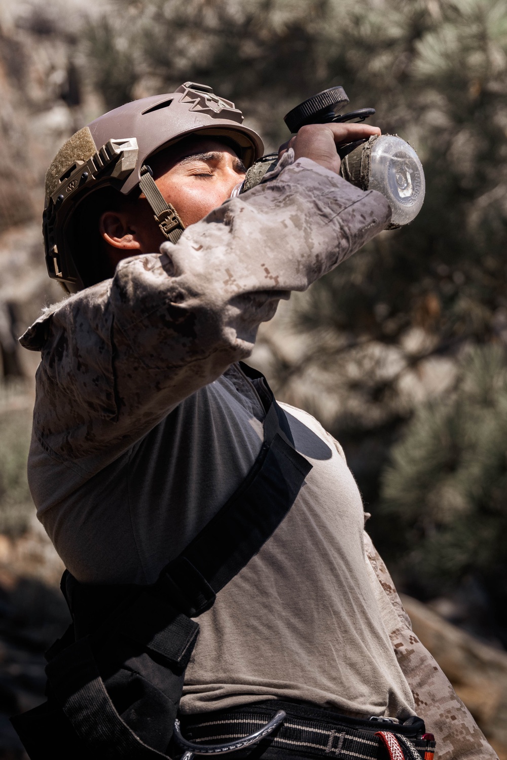 V35 and V11 Marines conduct lead climbing evaluation during Assault Climbers Course