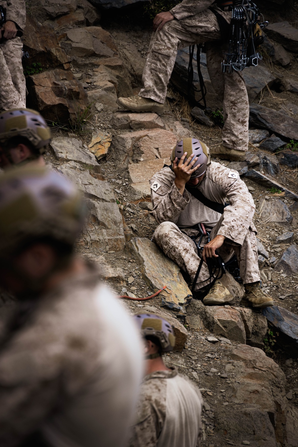 V35 and V11 Marines conduct lead climbing evaluation during Assault Climbers Course