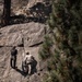 V35 and V11 Marines conduct lead climbing evaluation during Assault Climbers Course