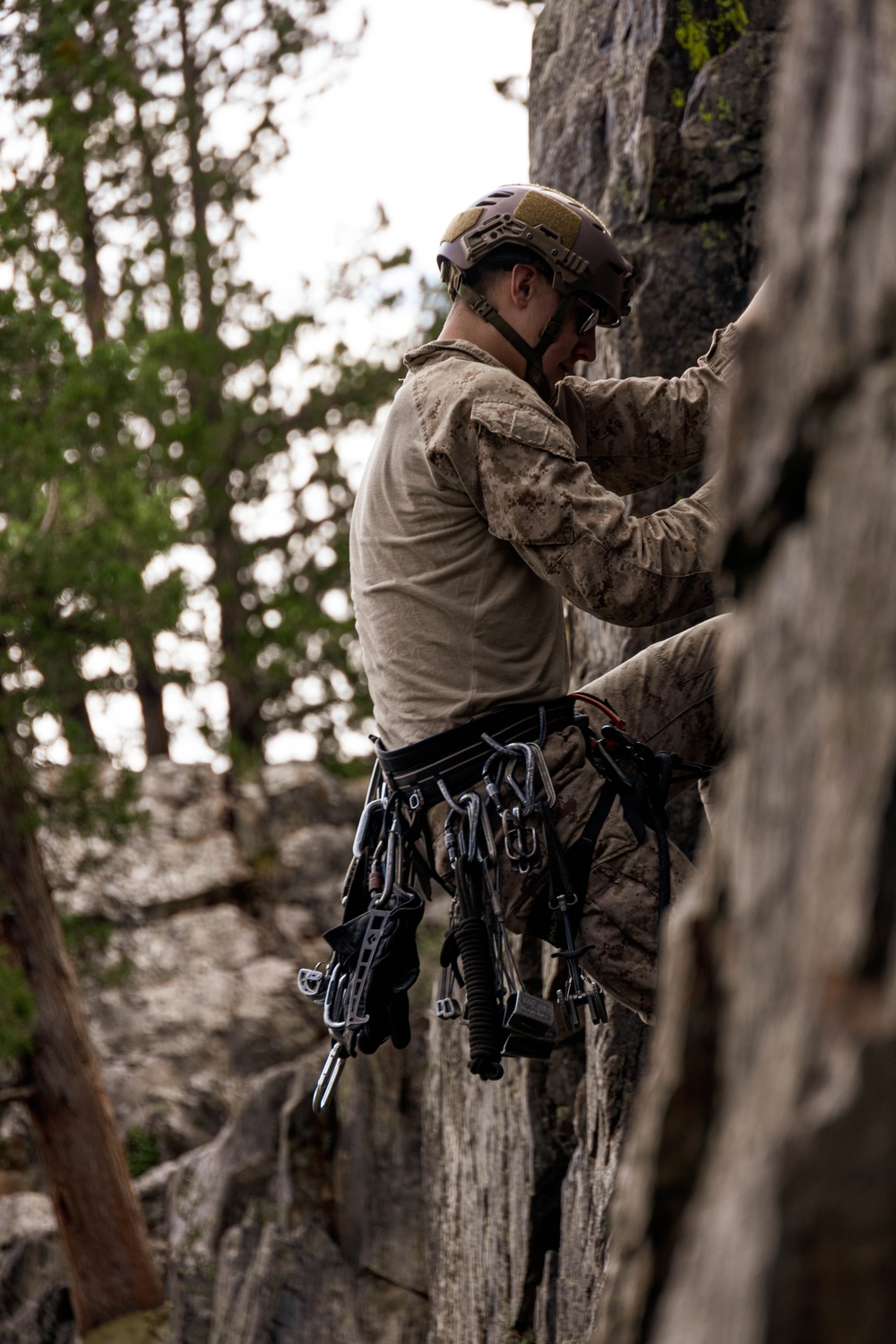V35 and V11 Marines conduct lead climbing evaluation during Assault Climbers Course