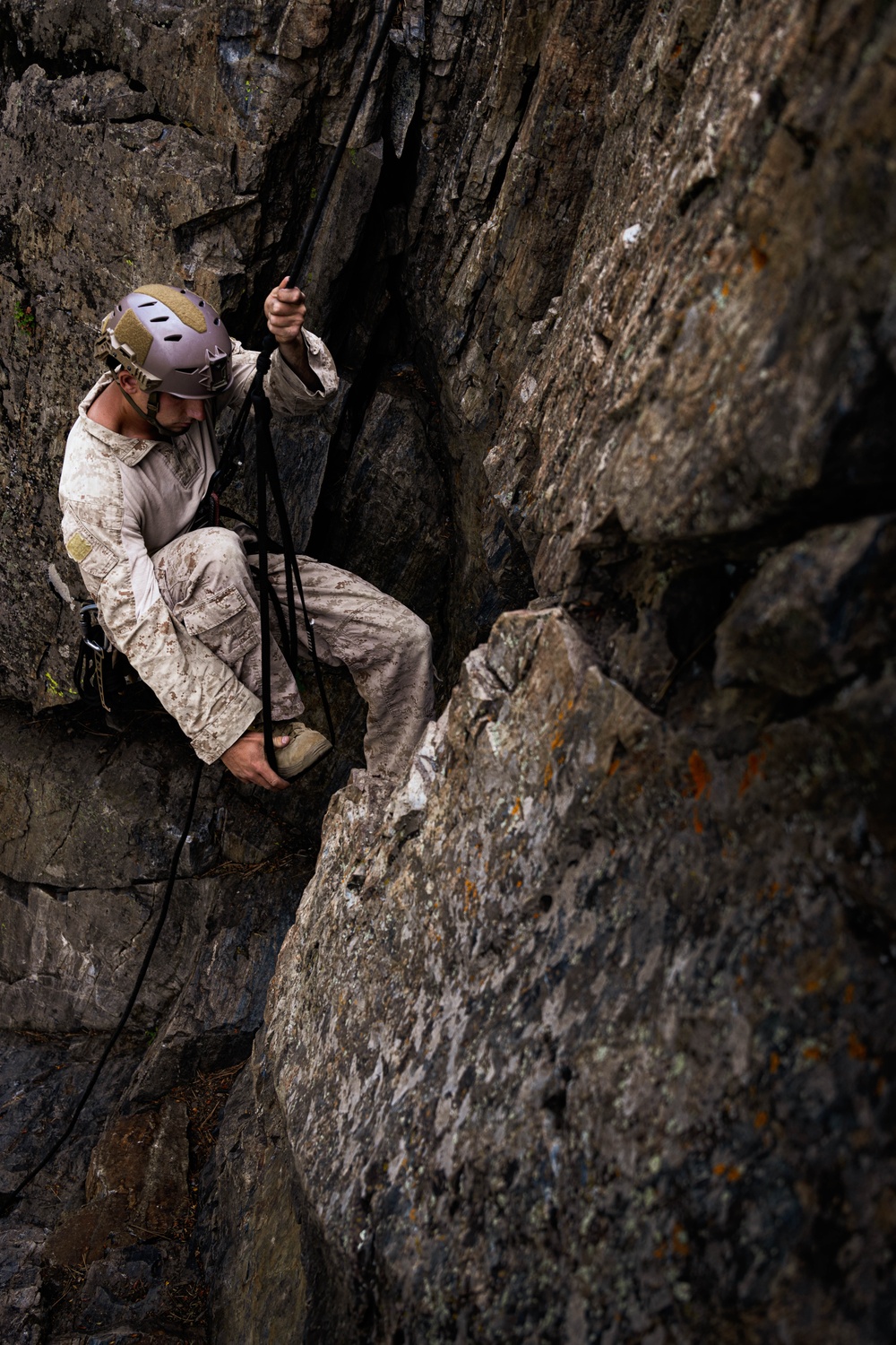 V35 and V11 Marines conduct lead climbing evaluation during Assault Climbers Course