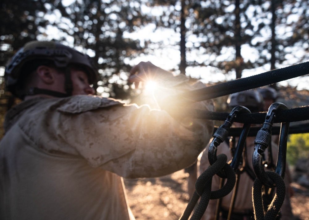 V35 and V11 Marines conduct climbing techniques during Assault Climbers Course