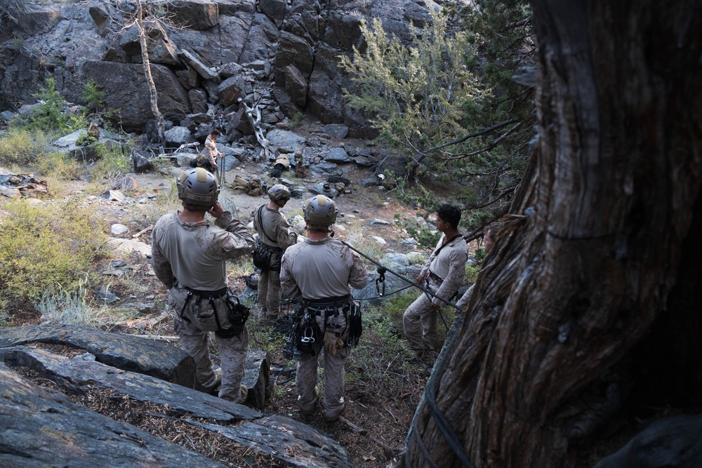 V35 and V11 Marines conduct climbing techniques during Assault Climbers Course