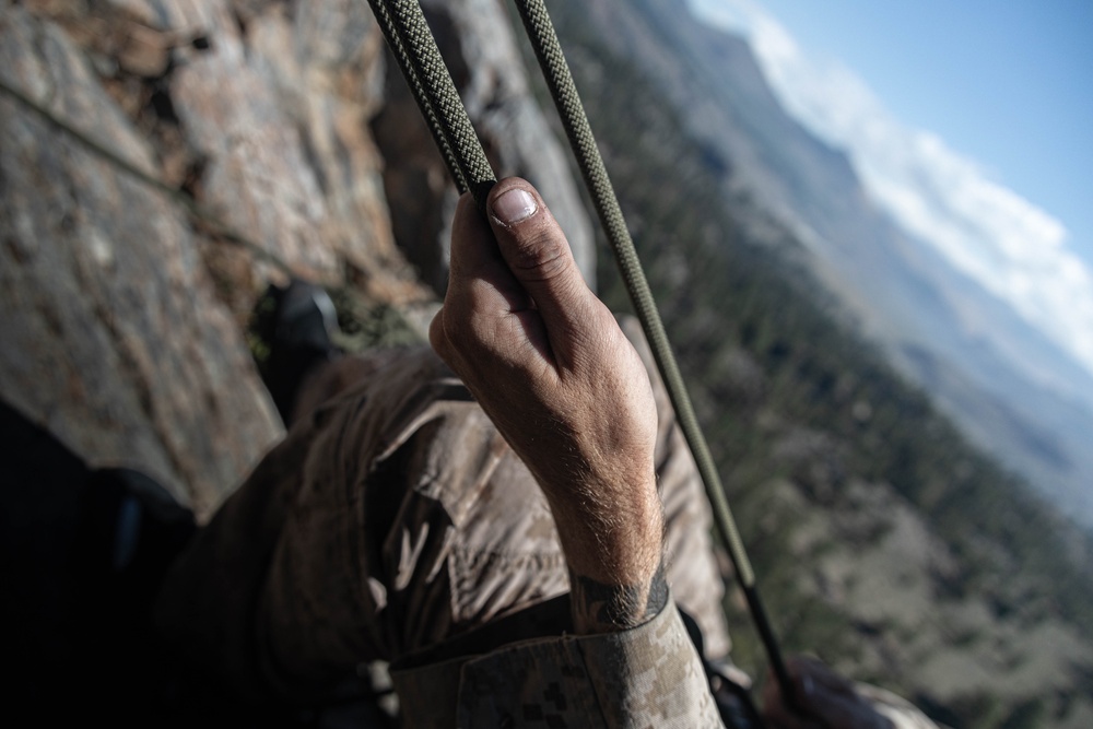 V35 and V11 Marines conduct climbing techniques during Assault Climbers Course