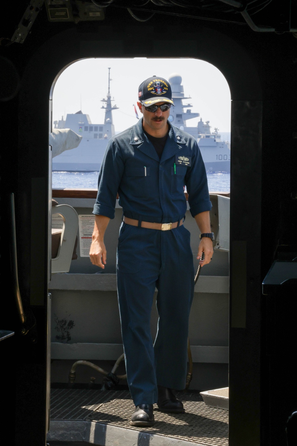 The USS Truxtun Sails in formation with partner nations