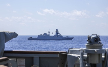 The USS Truxtun Sails in formation with partner nations