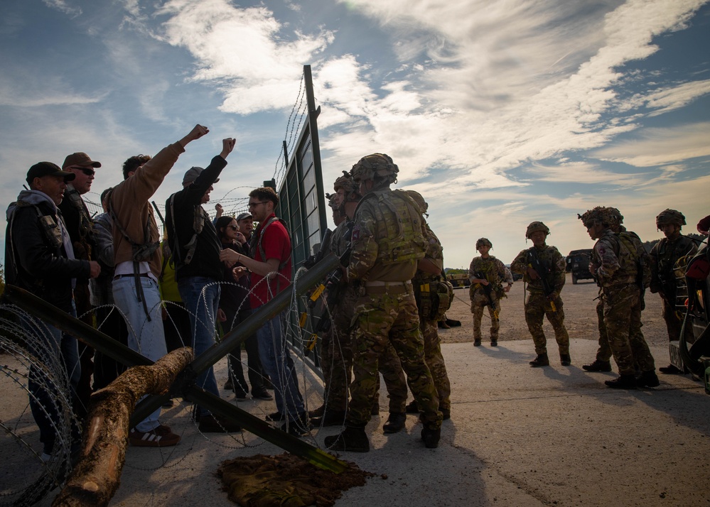 Resupply Battalions Interact with Civilians in Simulated Training Exercise